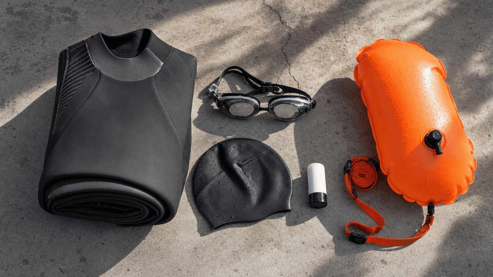 London T100 2026 swim rules: the 24.9°C wetsuit threshold, tow-float plan, and what to pack